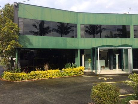 mitchell glass pty ltd building with glass doors and enterence with glass doors