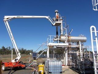 Man Checking Equipment — Gas Compliance Services in Yeppon, QLD