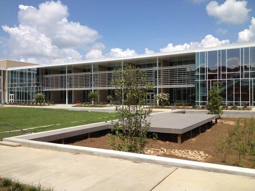 Building and Fields Against Blue Sky — Chattanooga, TN — Hubbuch Glass Co