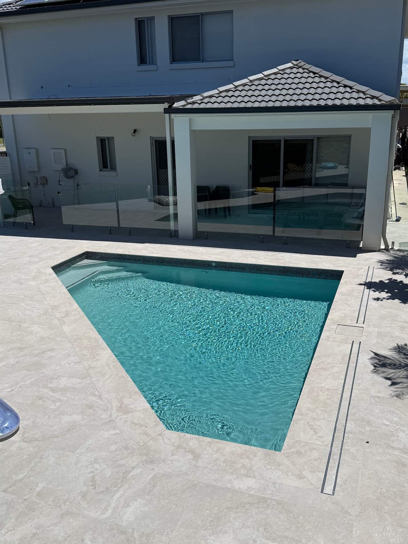 A custom gold coast swimming pool built by JKO Construction
