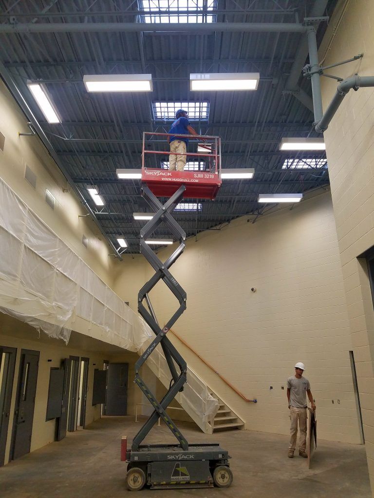 Bethune Painting offers a variety of professional painting and power washing services, including high ceilings