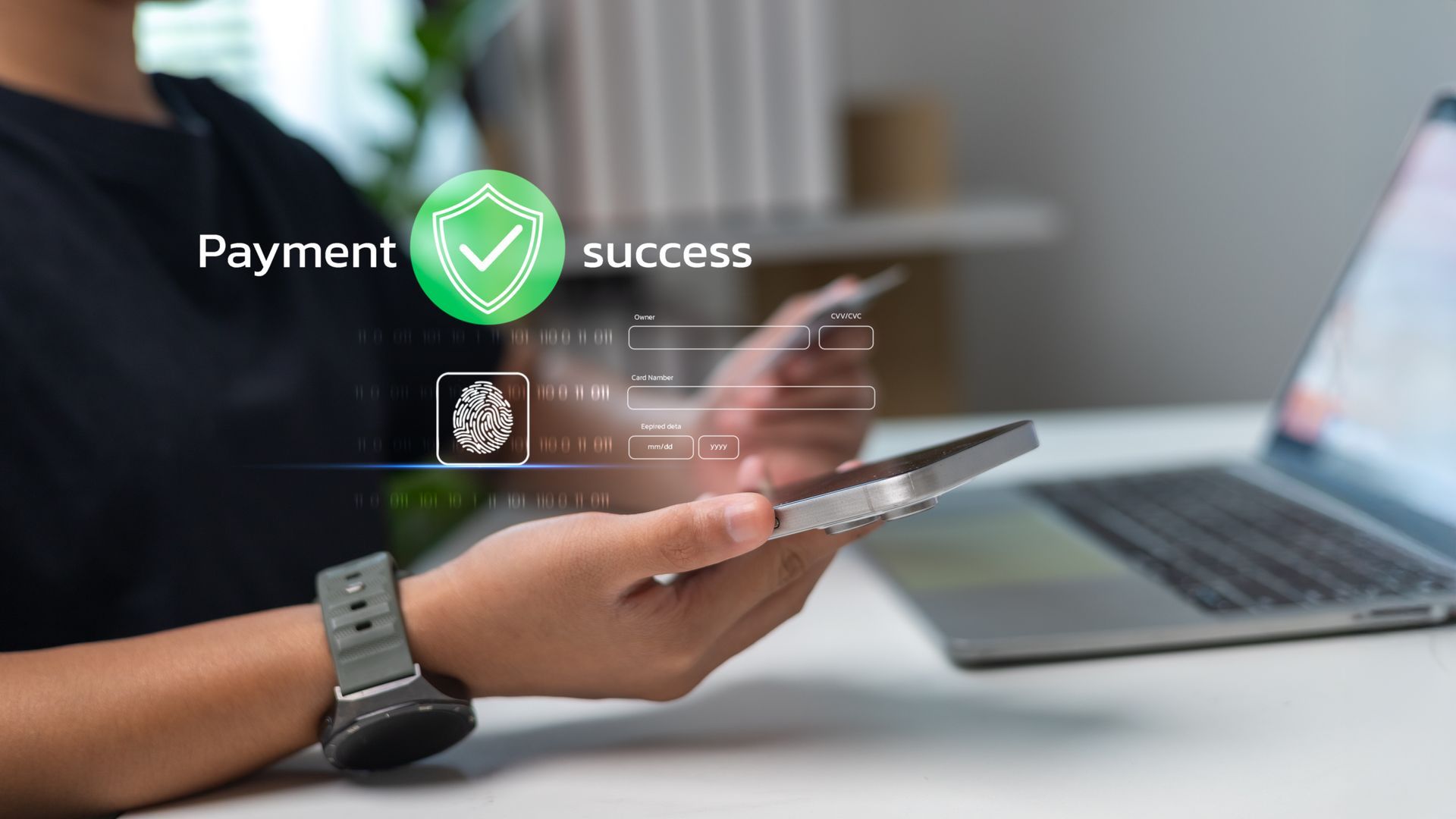 Person holding phone, credit card, and using laptop. Payment successful icon displayed.
