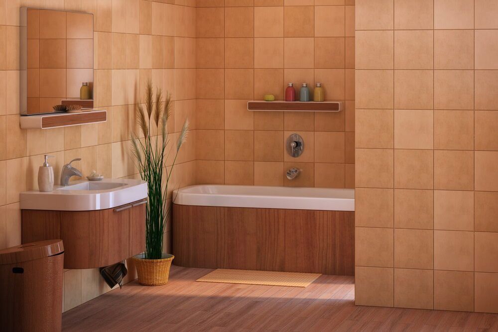Bathroom With Brown Tiles, Wooden Vanity and Bathtub, and a Potted Plant — Unique Waterproofing Solutions in North Rocks, NSW