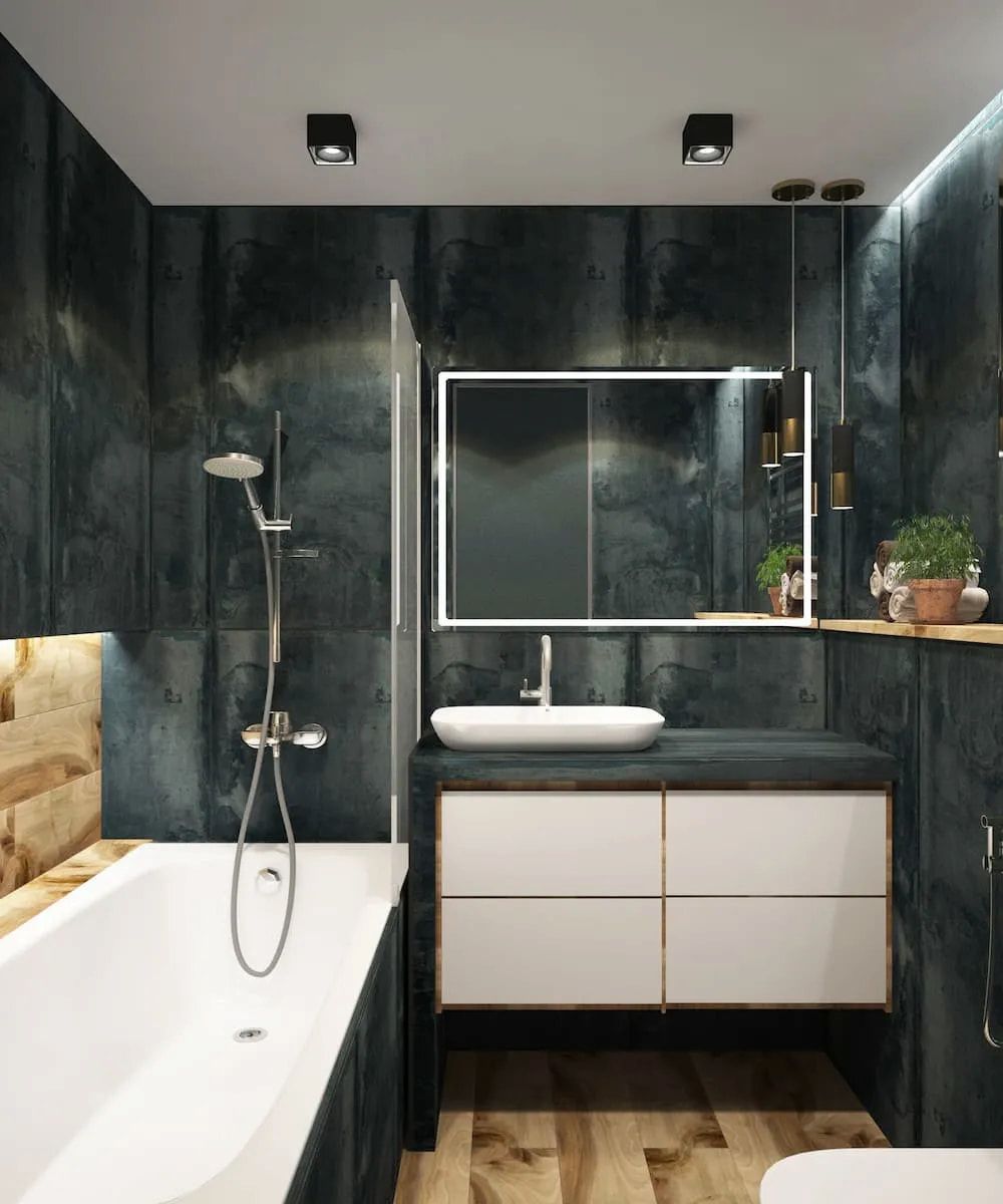 Modern Bathroom With Dark Teal Tile, White Vanity, Tub and Flooring — Unique Waterproofing Solutions in North Rocks, NSW