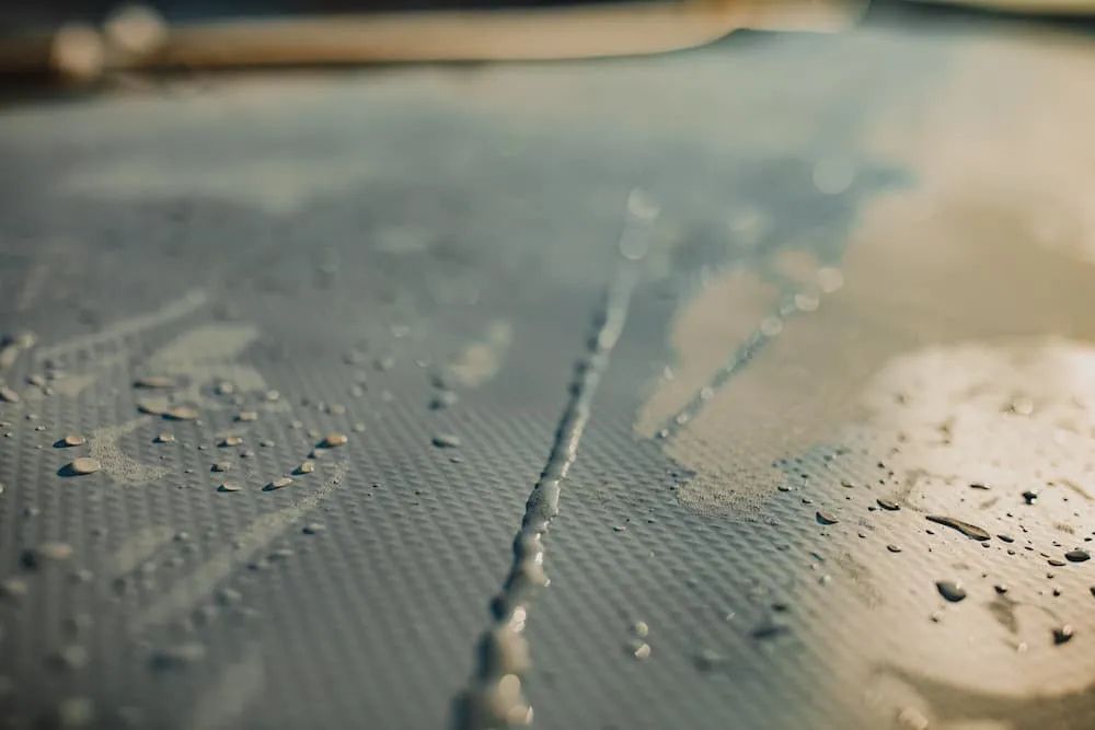 View of Liquid Dripping Along a Textured Surface — Unique Waterproofing Solutions in North Rocks, NSW