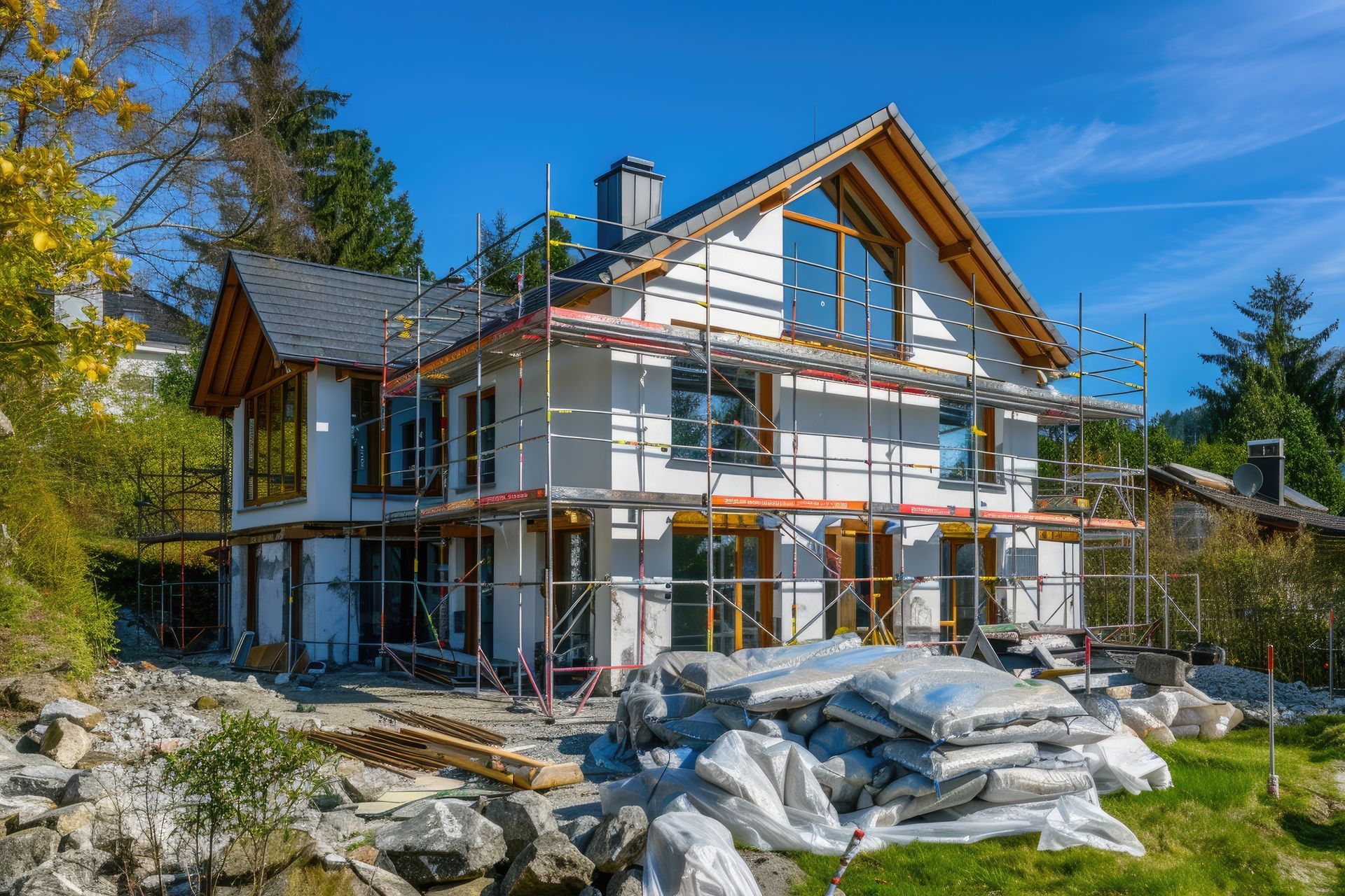 A house is being built with scaffolding around it.