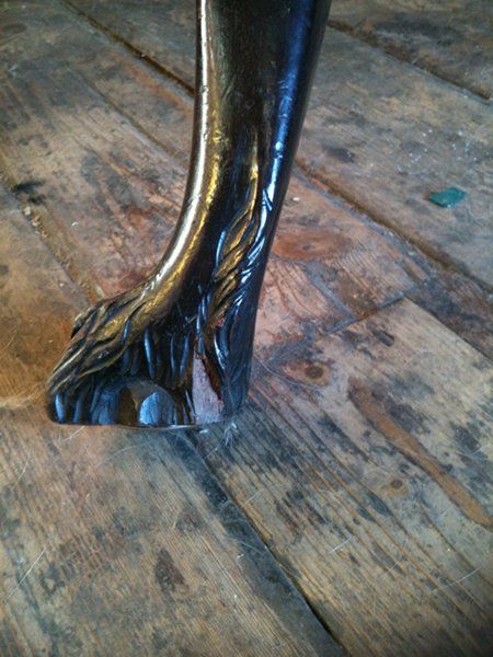 A chair leg after being repaired