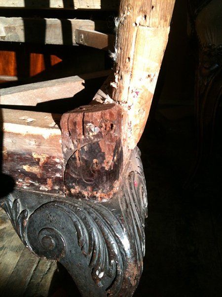 A chair leg before being repaired