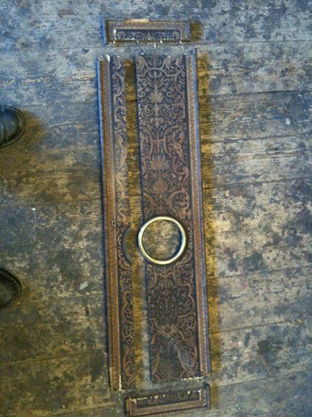 A worn out clock door