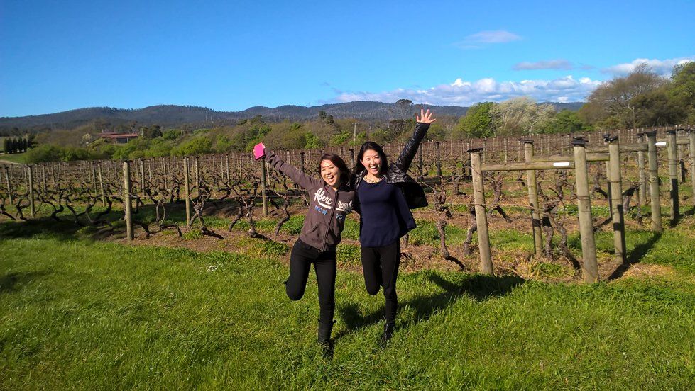 Two women enjoying a wine tour.