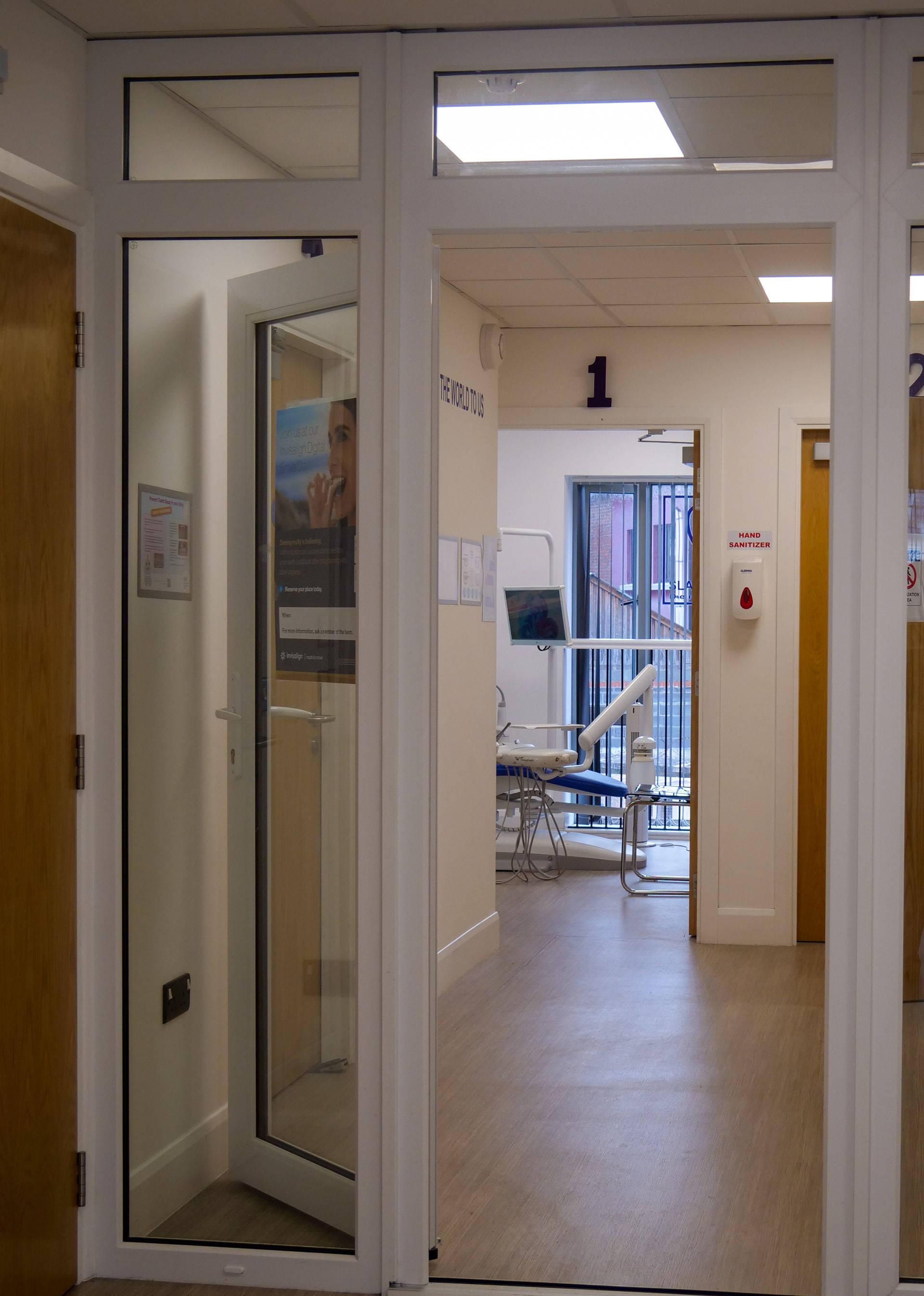 Clean hallway at Slade Castle Dental Clinic with modern design