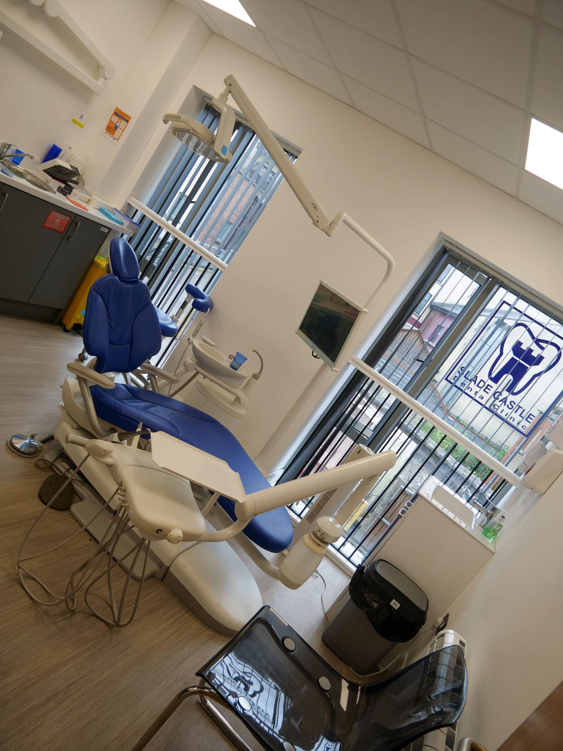 Modern dental treatment room with natural lighting at Slade Castle Dental Clinic