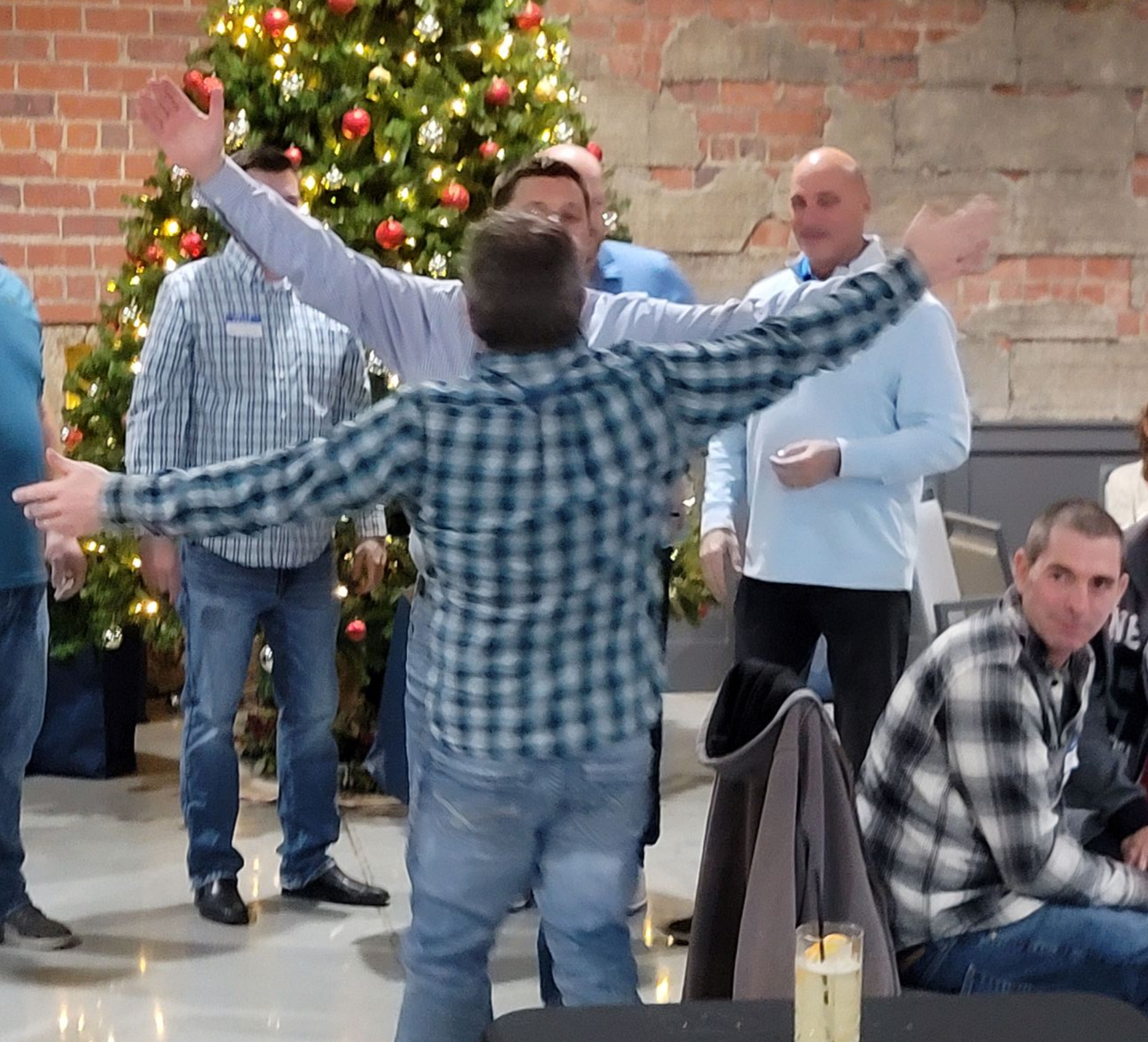 hugs at sh distributing christmas party