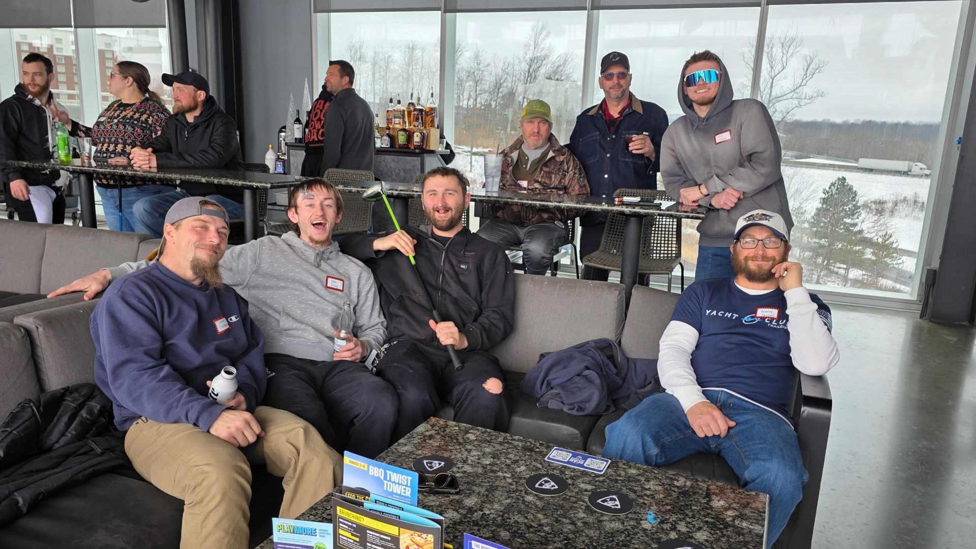 Employees enjoying top golf outing