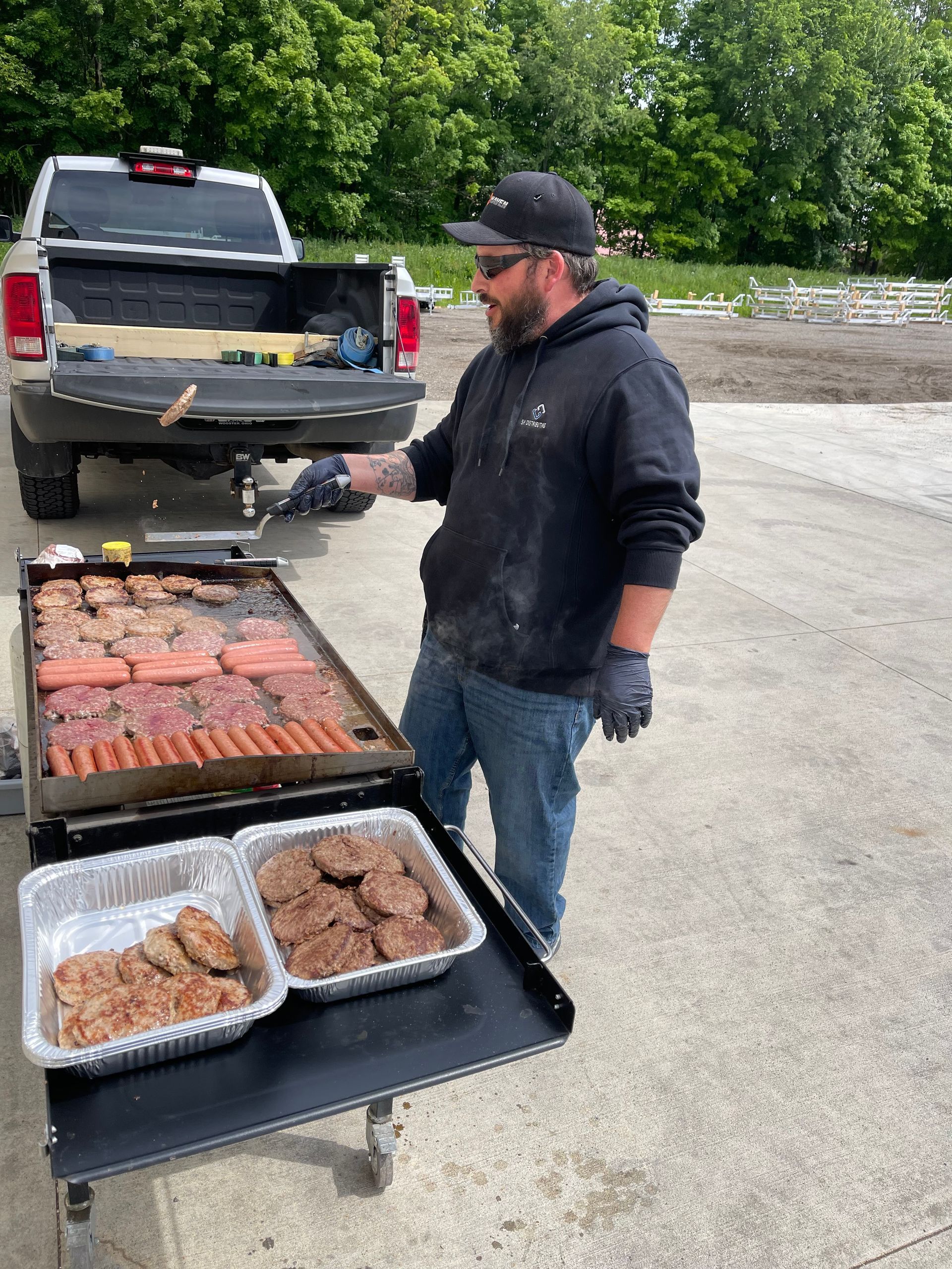 Jason cooking burgers at SH Distributing