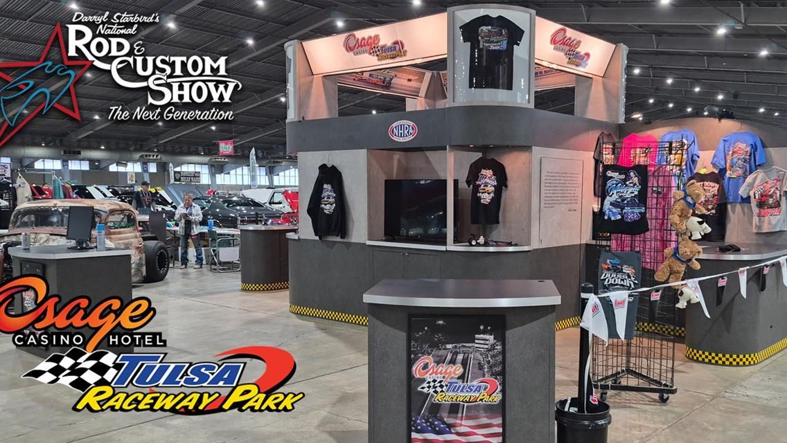 Man walking past a blue