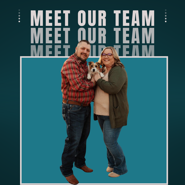 Couple holding a dog on Midwest Dog Center