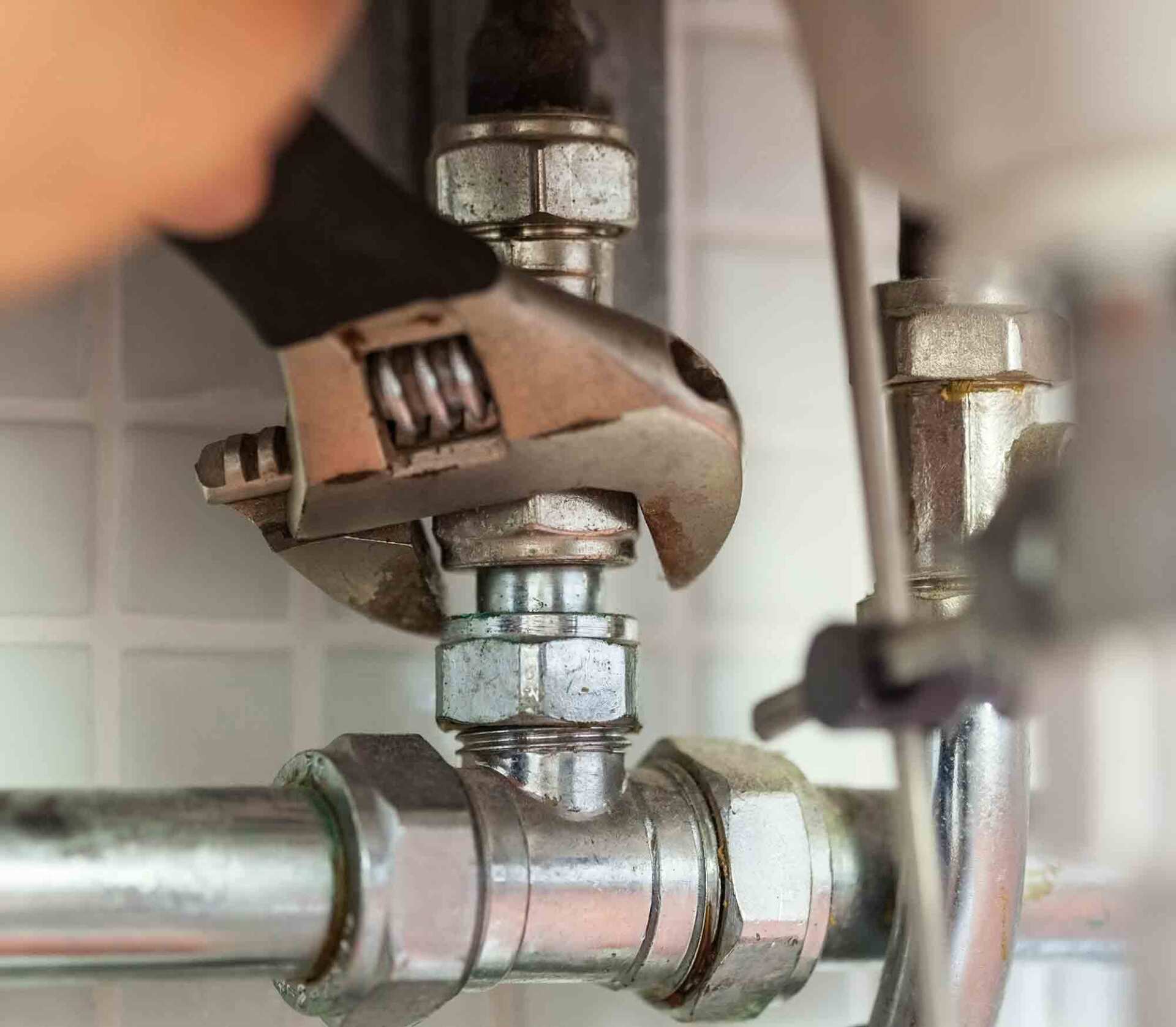 fixing the pipelines with adjustable wrench