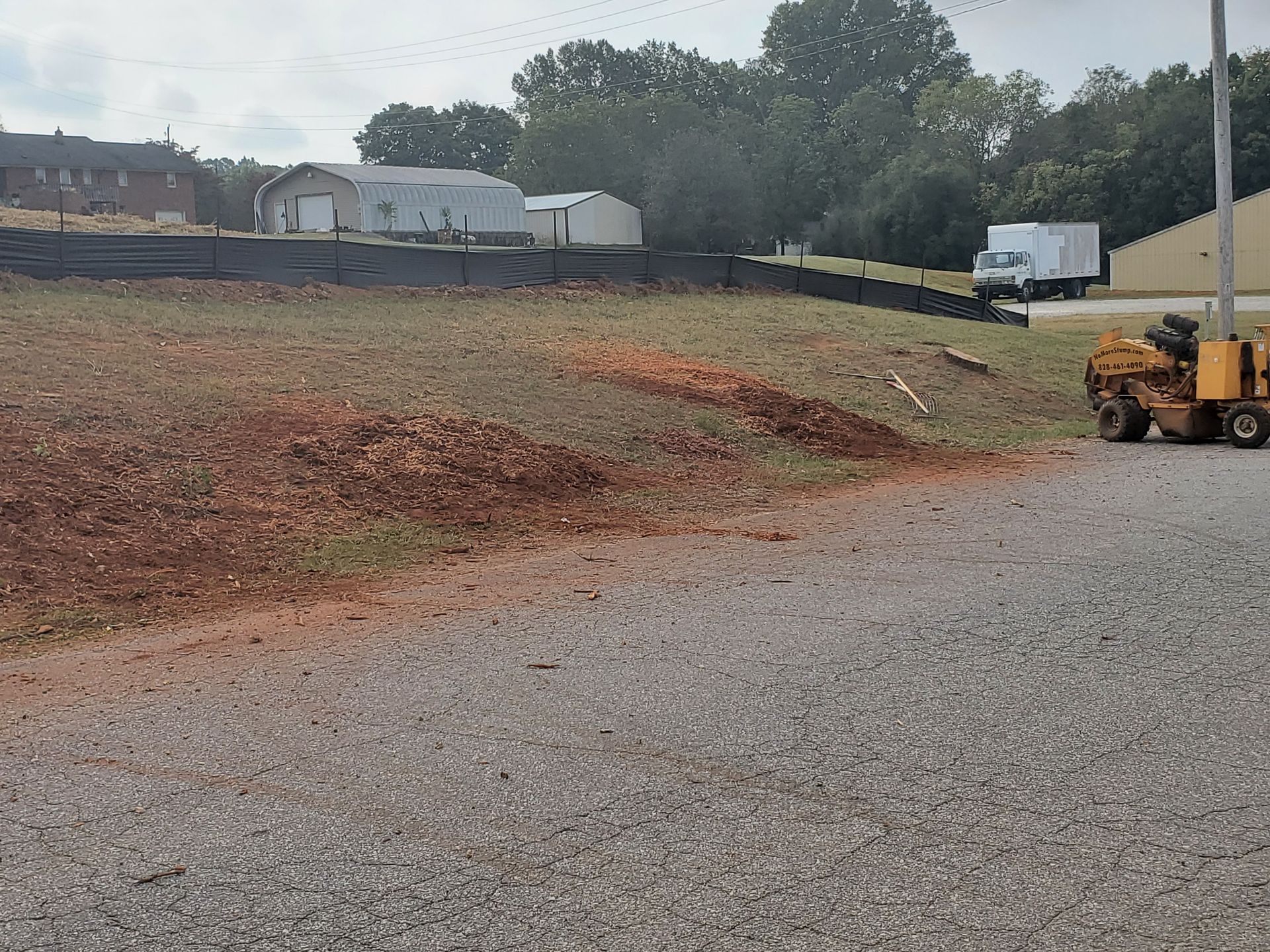 after grinding stumps on a hill