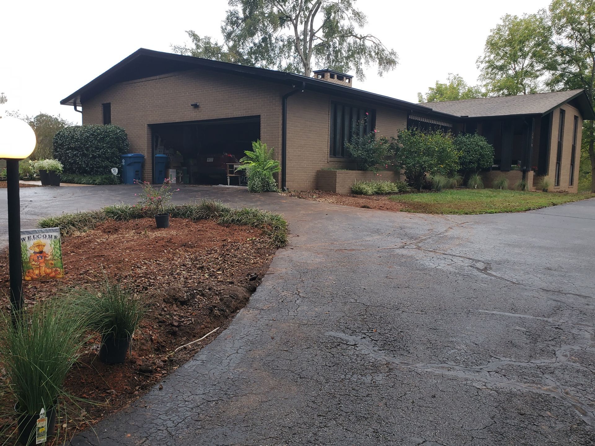 Photo of after the stumps were removed that were next to a driveway