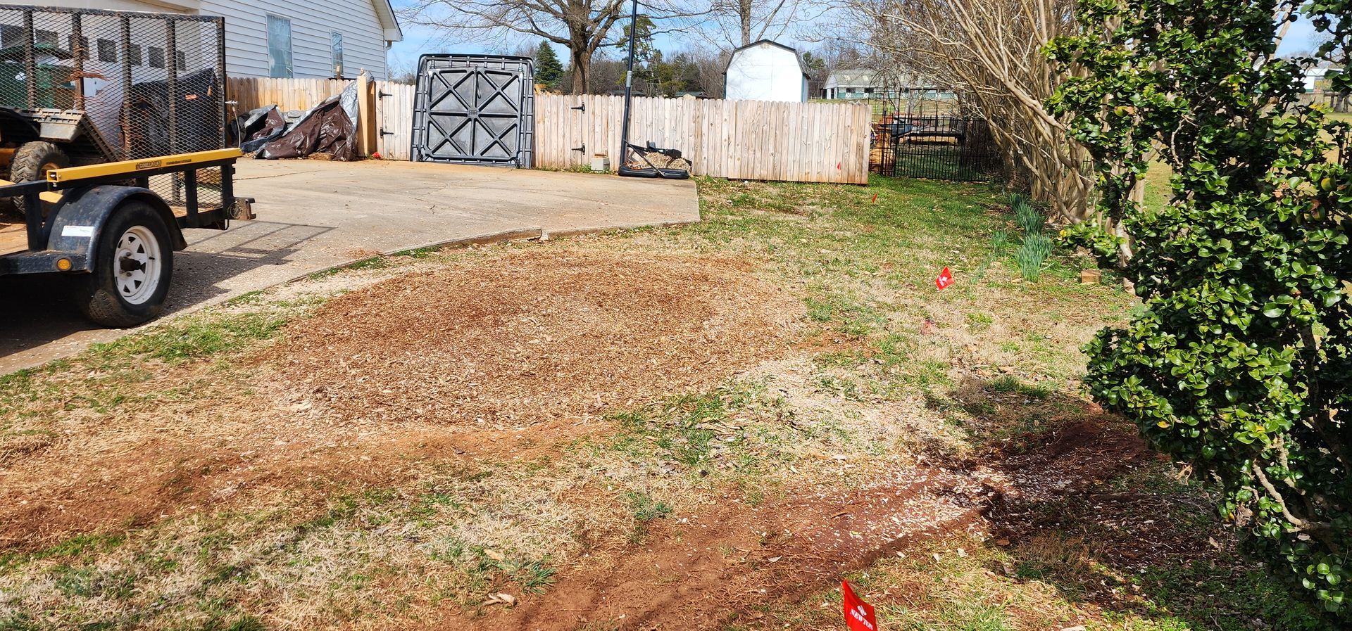 after grinding a stump next to a driveway