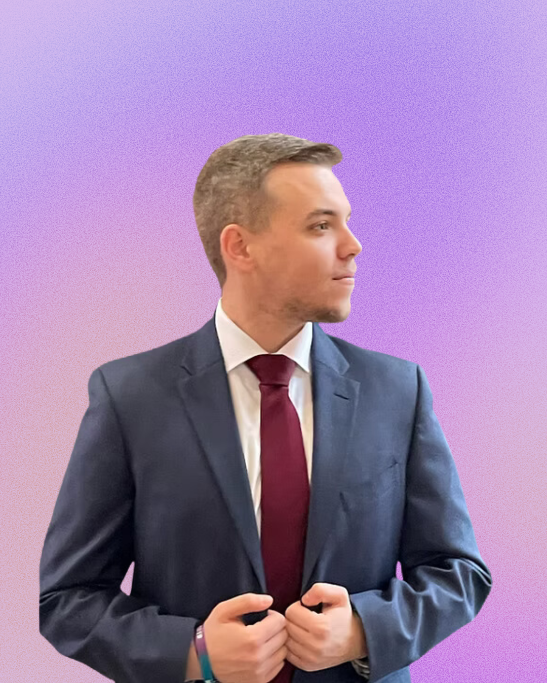 A man in a suit and tie is adjusting his jacket