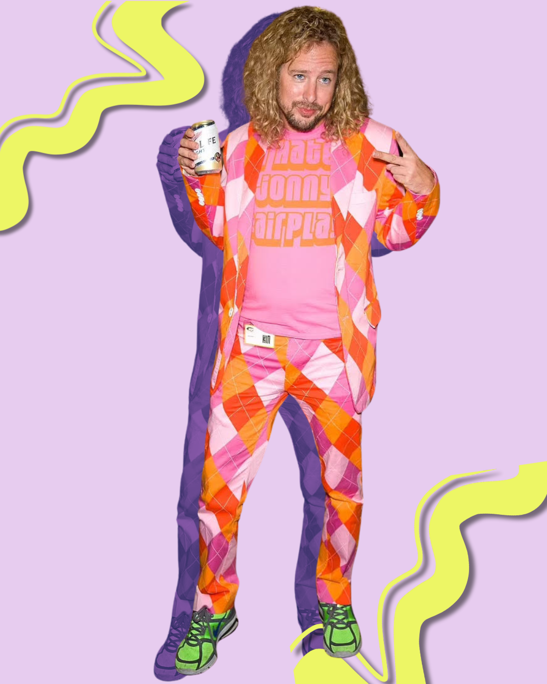 A man wearing a pink shirt that says ' i am a dork ' on it