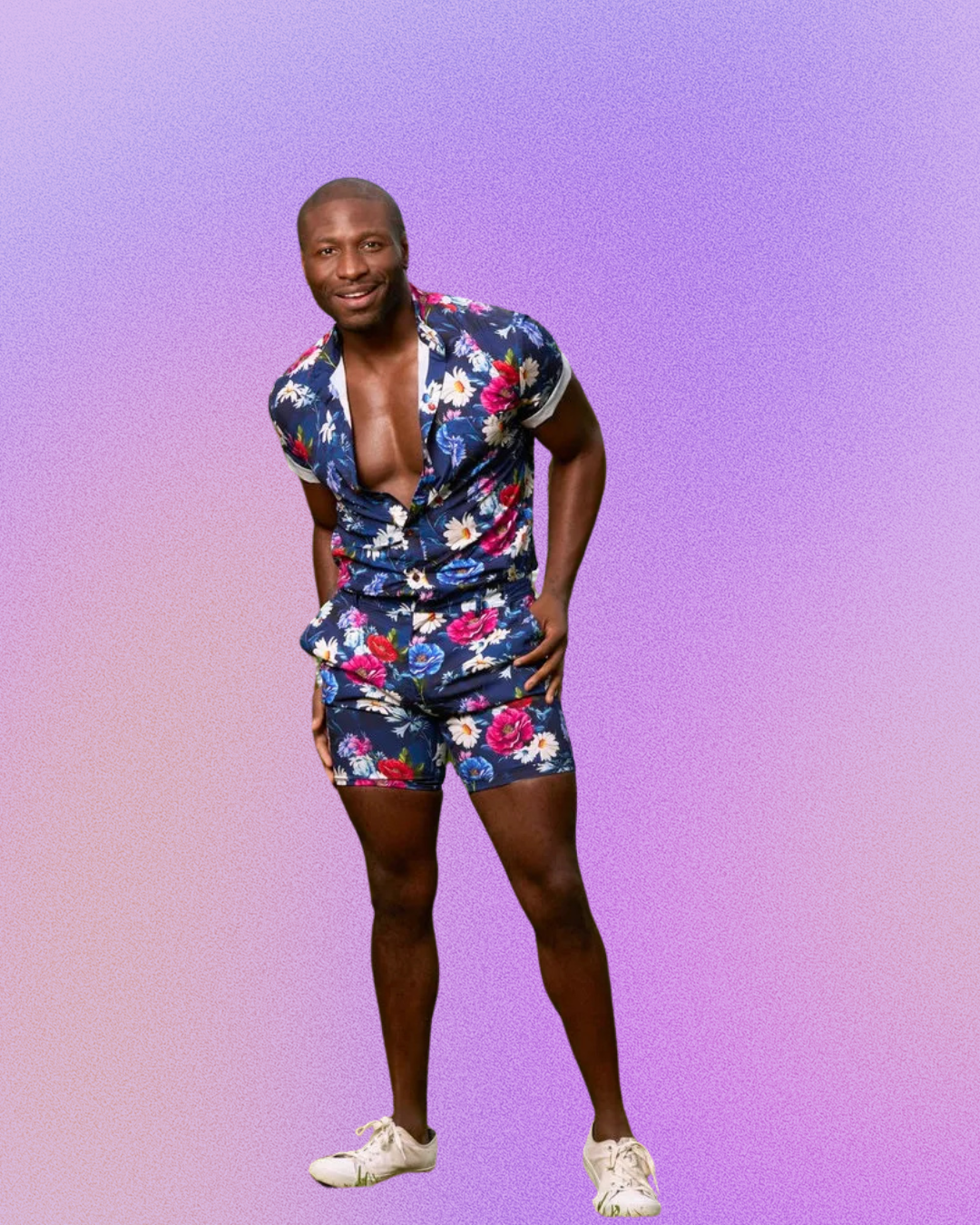A man in a floral jumpsuit is standing in front of a purple background.