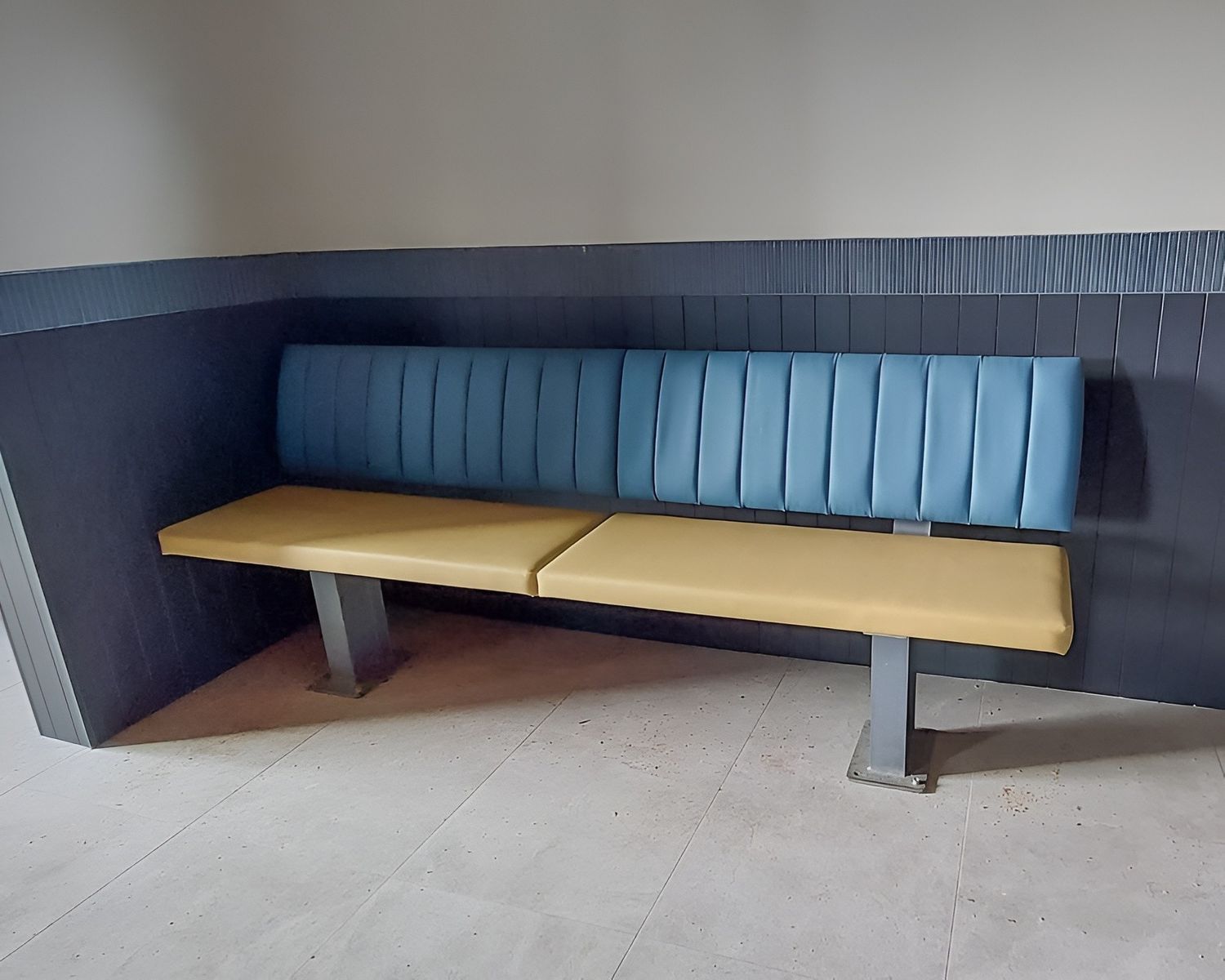 A Booth-style Bench With Blue and Yellow Upholstered Sections — McCormick Upholstery In Coolum Beach, QLD
