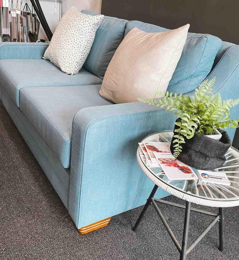 Light Blue Sofa With Two Pillows — McCormick Upholstery In Coolum Beach, QLD