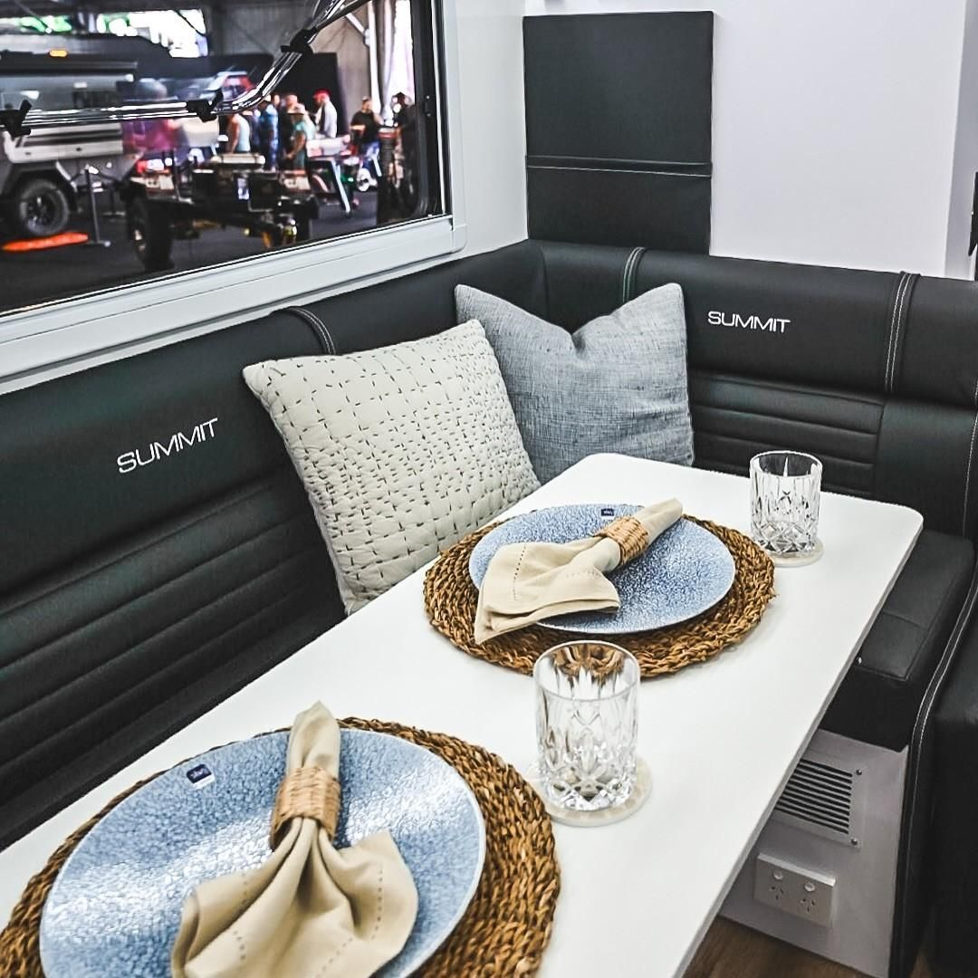 Interior of a Caravan With a Dining Area. White Table Set for Two — McCormick Upholstery In Coolum Beach, QLD
