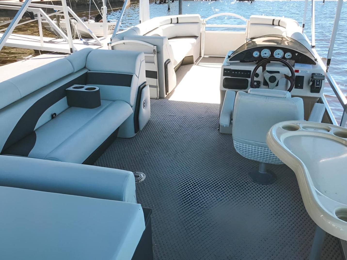 Interior of a Pontoon Boat With White and Gray Seating — McCormick Upholstery In Coolum Beach, QLD