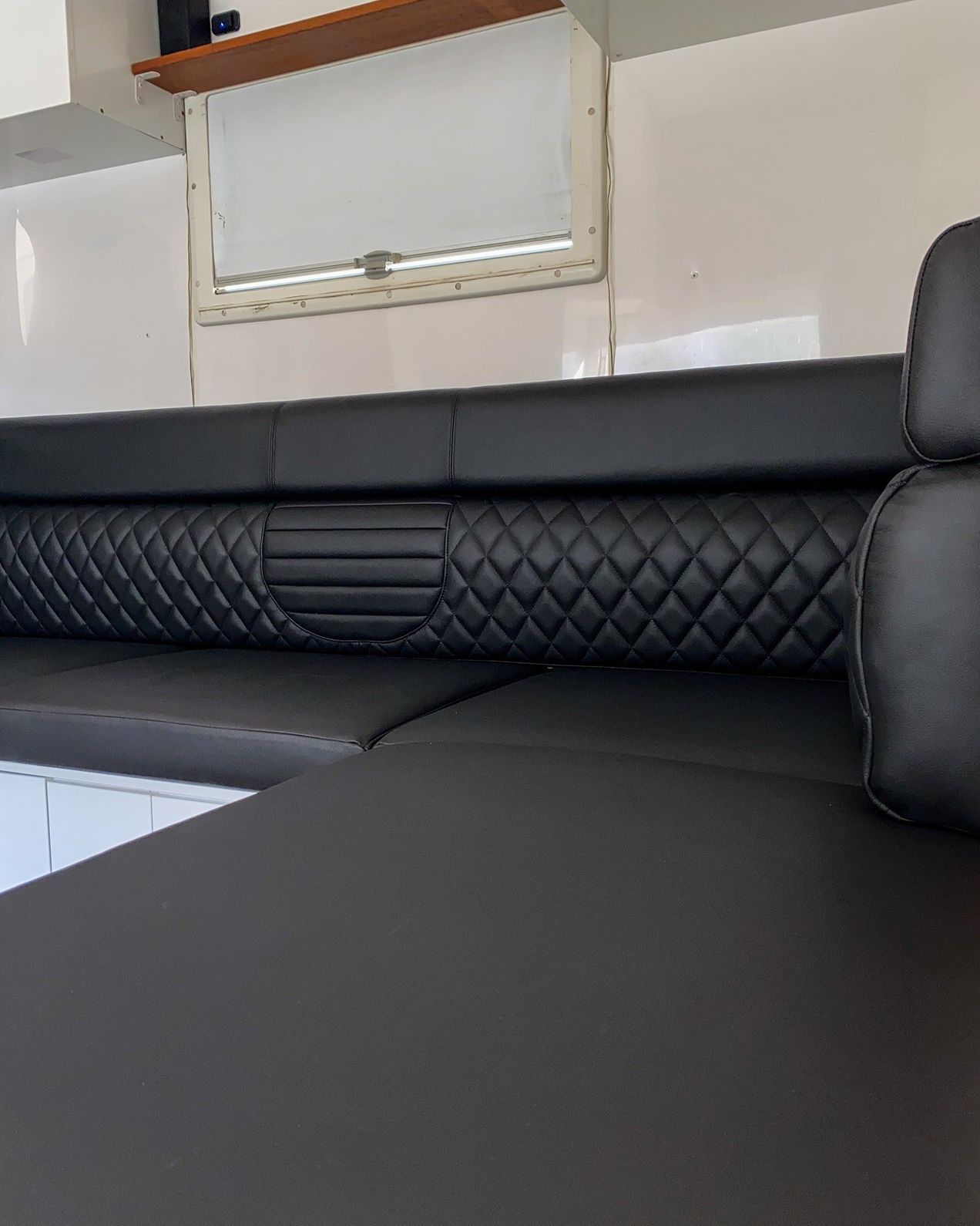 Black Leather Seating in a White-walled Interior — McCormick Upholstery In Coolum Beach, QLD