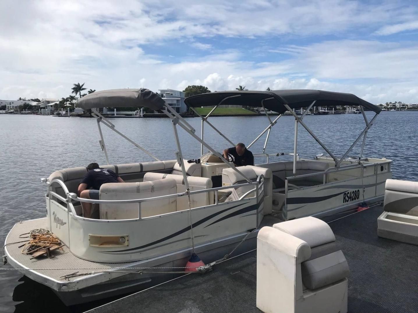 A Pontoon Boat Docked on the Water — McCormick Upholstery In Coolum Beach, QLD