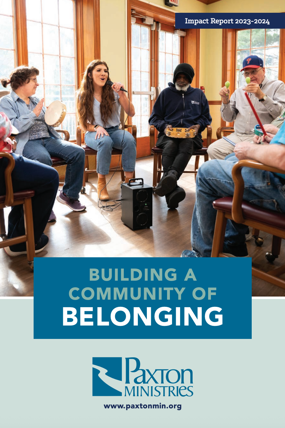 People gathered in a room, some playing instruments, with text 