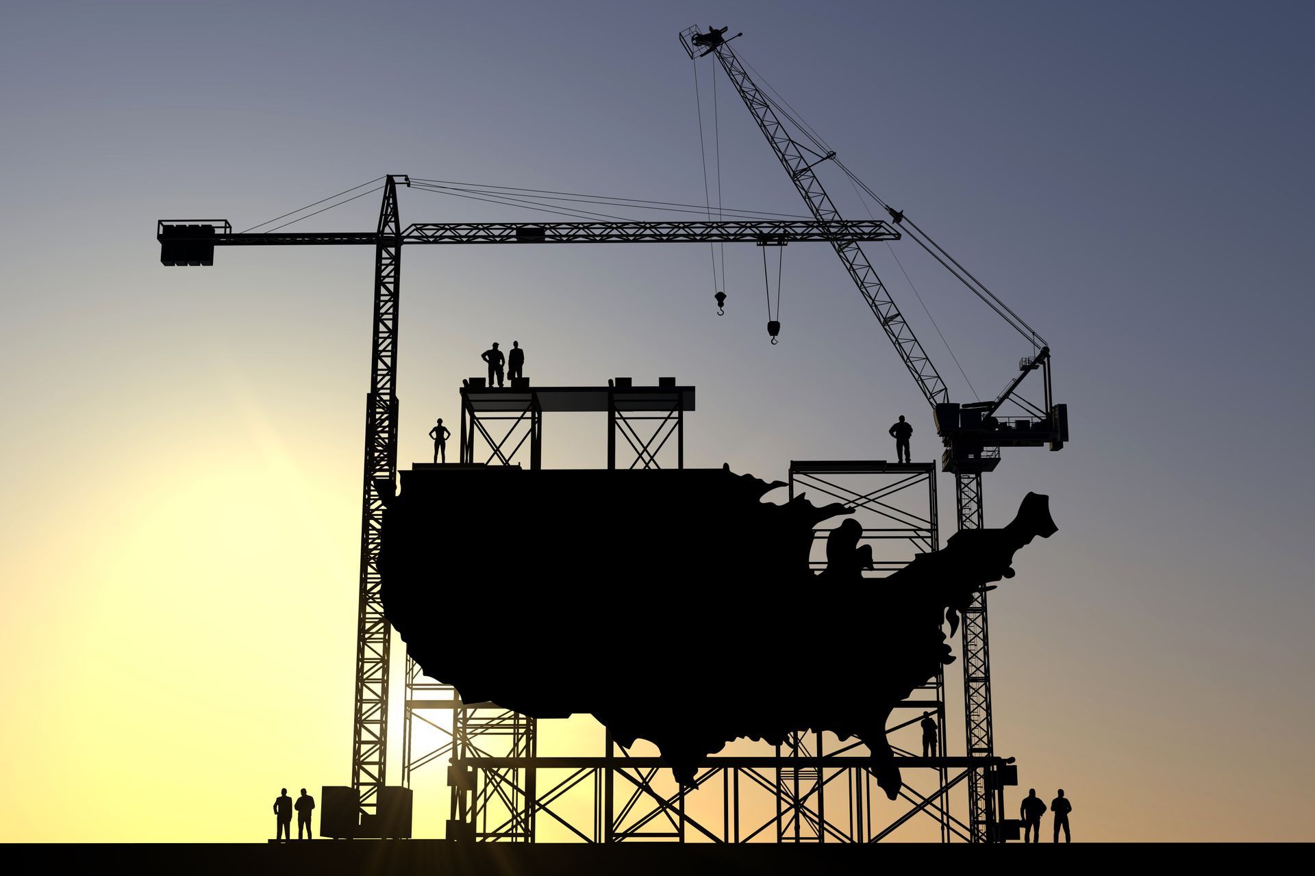 Silhouette of U.S. map under construction by crane and workers at sunset.