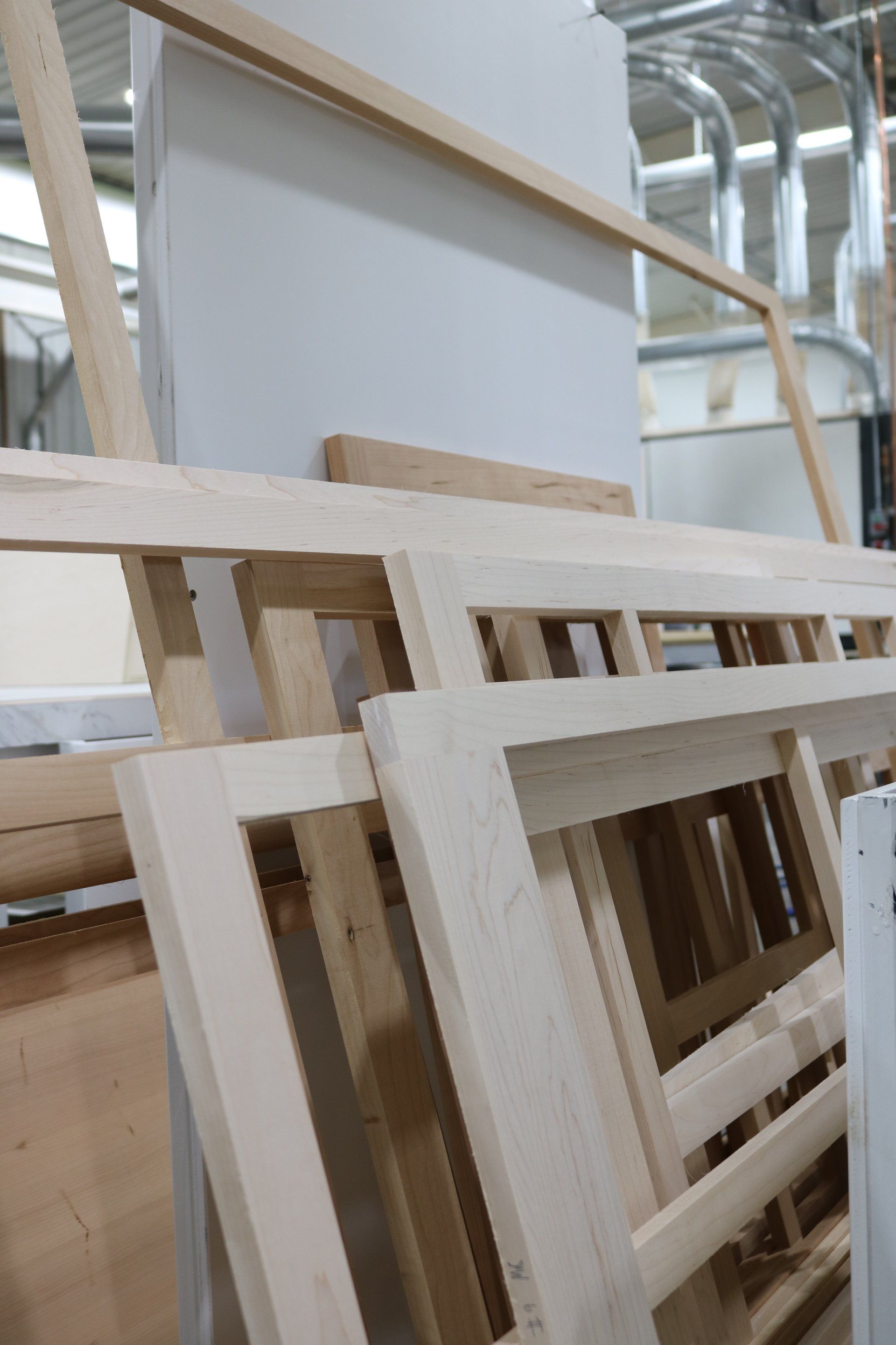 A bunch of wooden pieces are stacked on top of each other.