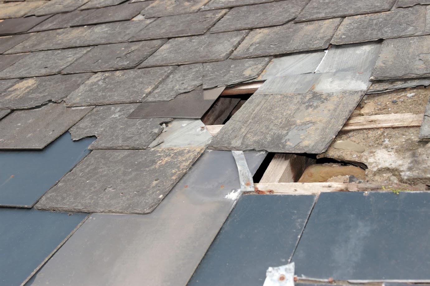 Broken Tile Roof — Kansas City, KS — Ratliff Enterprises Inc.