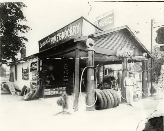 A black and white photo of a home grocery store