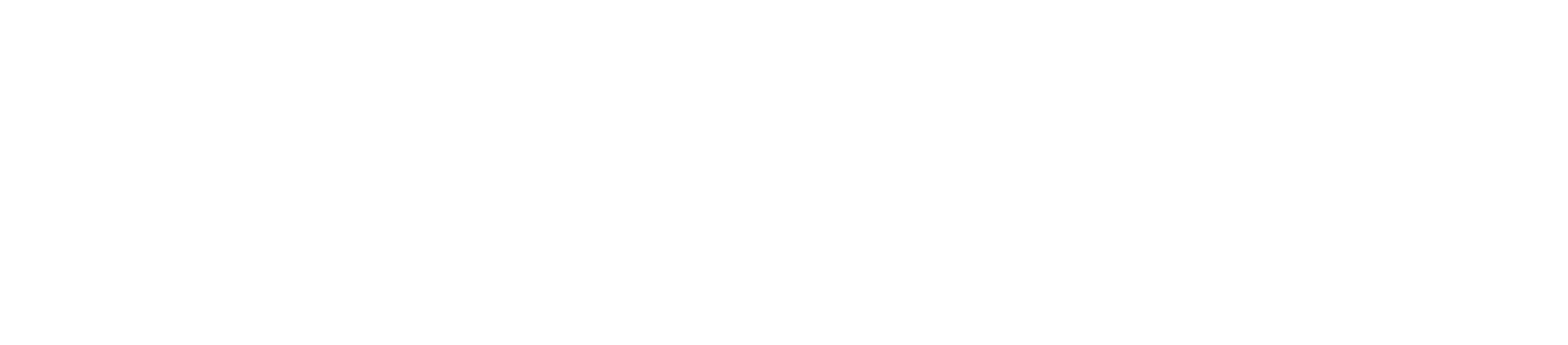 A green riding lawnmower cutting grass.