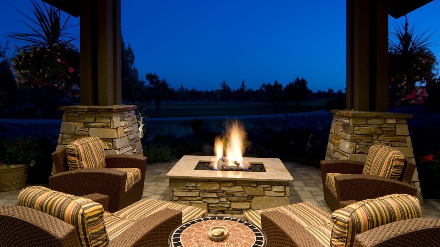 Custom outdoor living space with patio and fire pit in Blount County