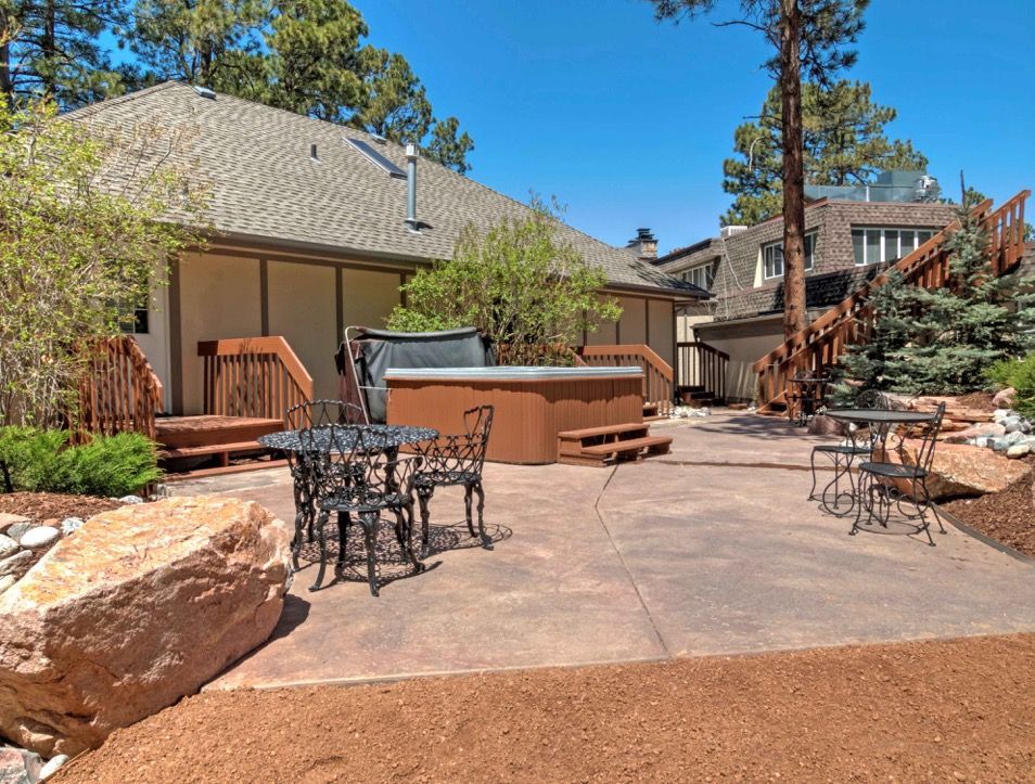 hot tub and outdoor area for guests