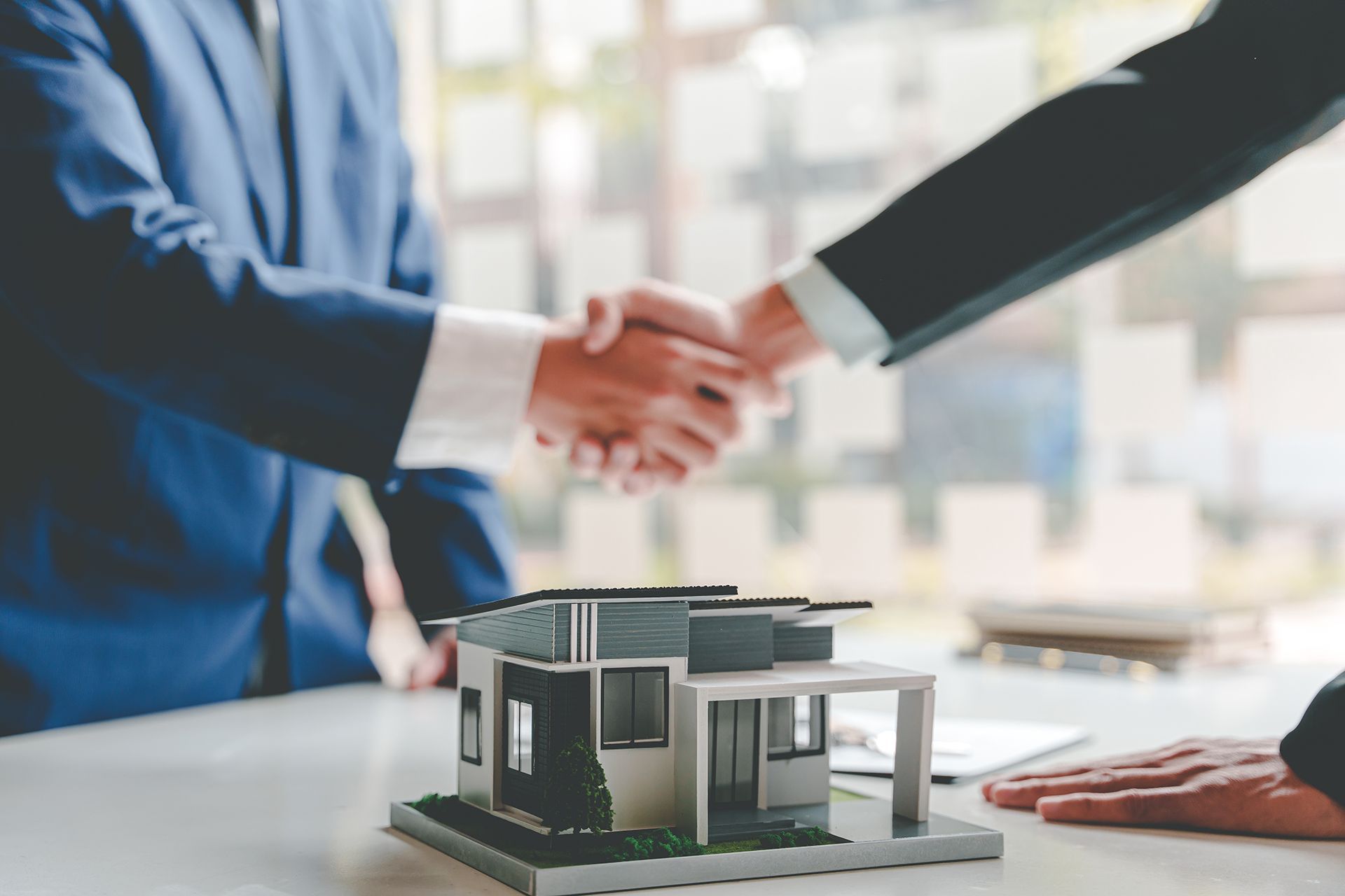 Agent and Client Shaking Hands