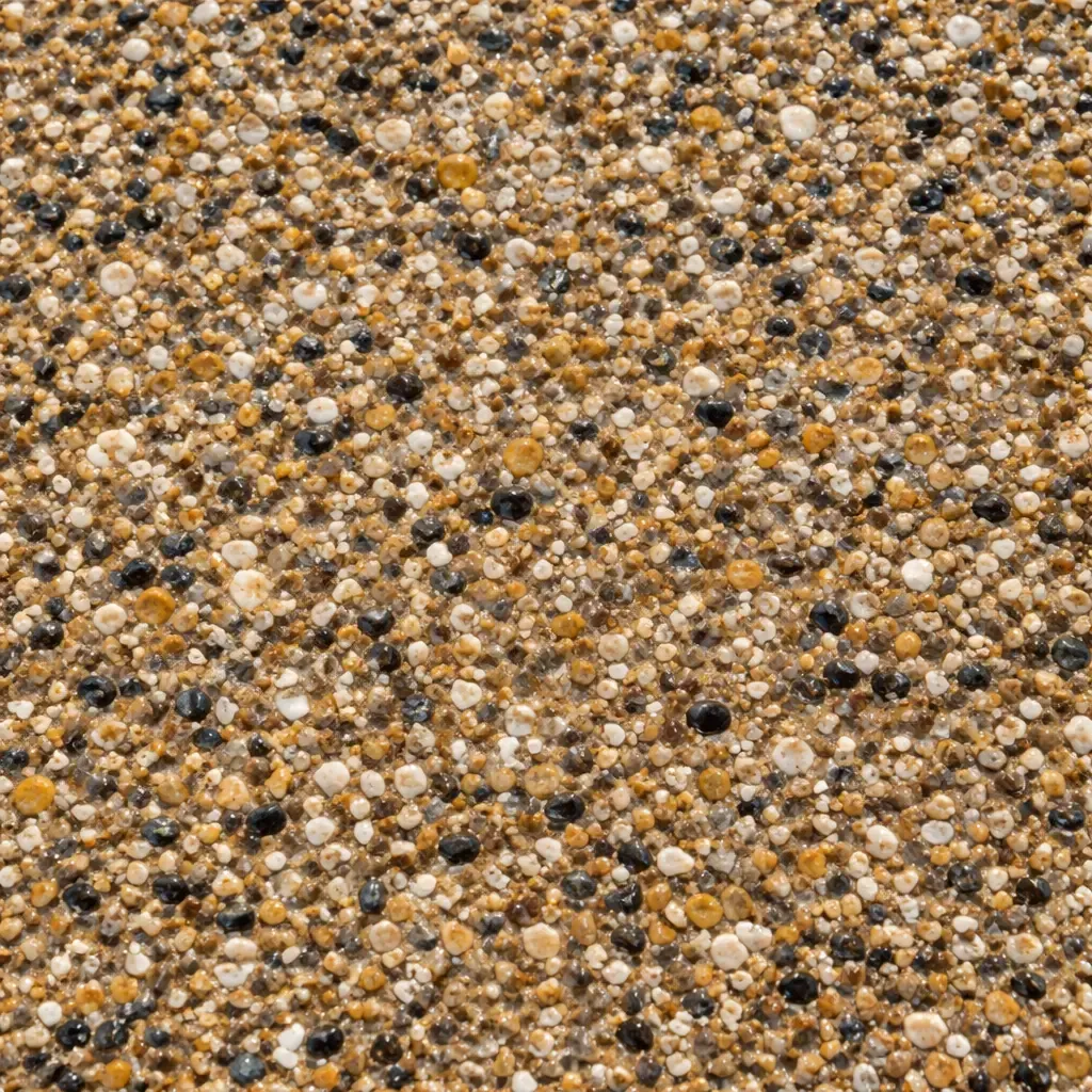 Close-up view of texture of coloured exposed aggregate concrete. Toowoomba Concreter