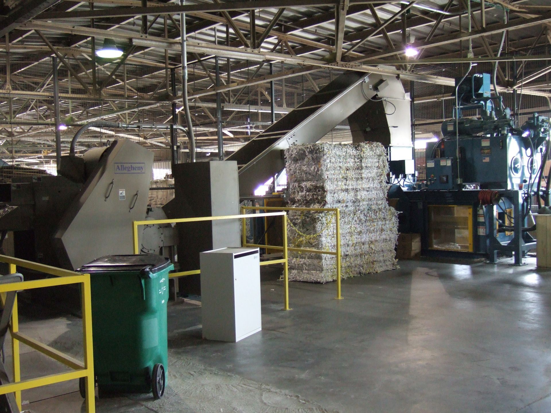 Man Recycling — Kansas City, MO — Midwest Shredding Service, LLC