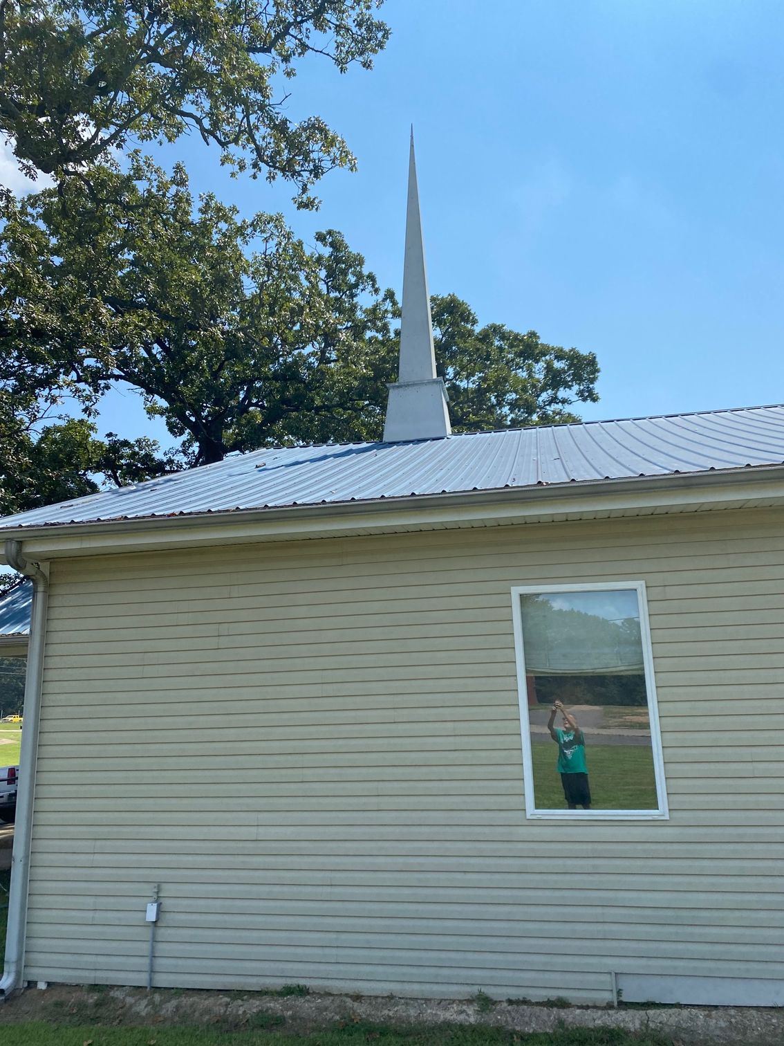 A church with a steeple on top of it