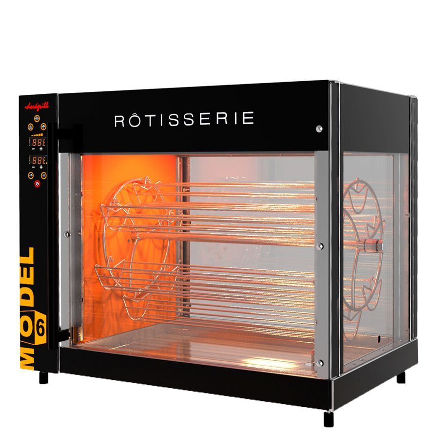 A rotisserie oven with a glass door is sitting on a table.