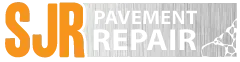 SJR Pavement Repair logo in orange and white on a textured gray background.