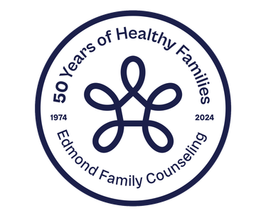 The logo for edmond family counseling shows a flower in a circle.