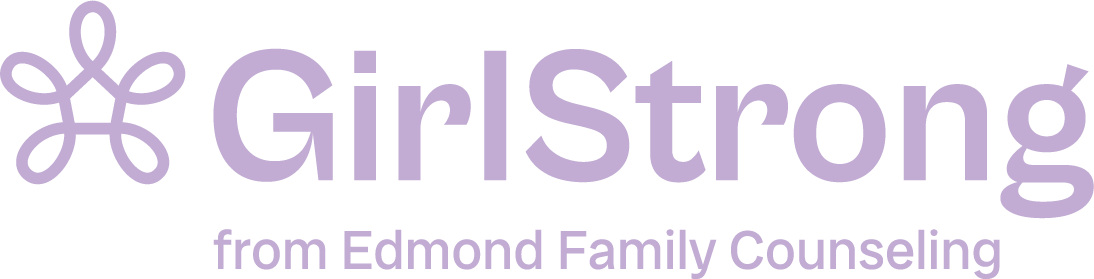 A purple logo for girl strong from edmond family counseling